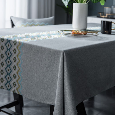 Rosa decorativo de la cubierta de tabla que se casa y cubierta de tabla de encargo del mantel azul
