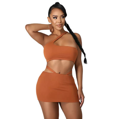 El top bikini del vestido de la camiseta con el color sólido de Hollowout de la cintura irregular fijó 2 pedazos