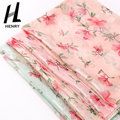 La luz suave de la tela de Tulle del pequeño estilo fresco texturiza los poliésteres tejidos de la gasa florales para el vestido